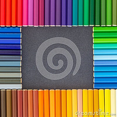 Ð¡olored pencils laid out in the form of a square with dark background Stock Photo